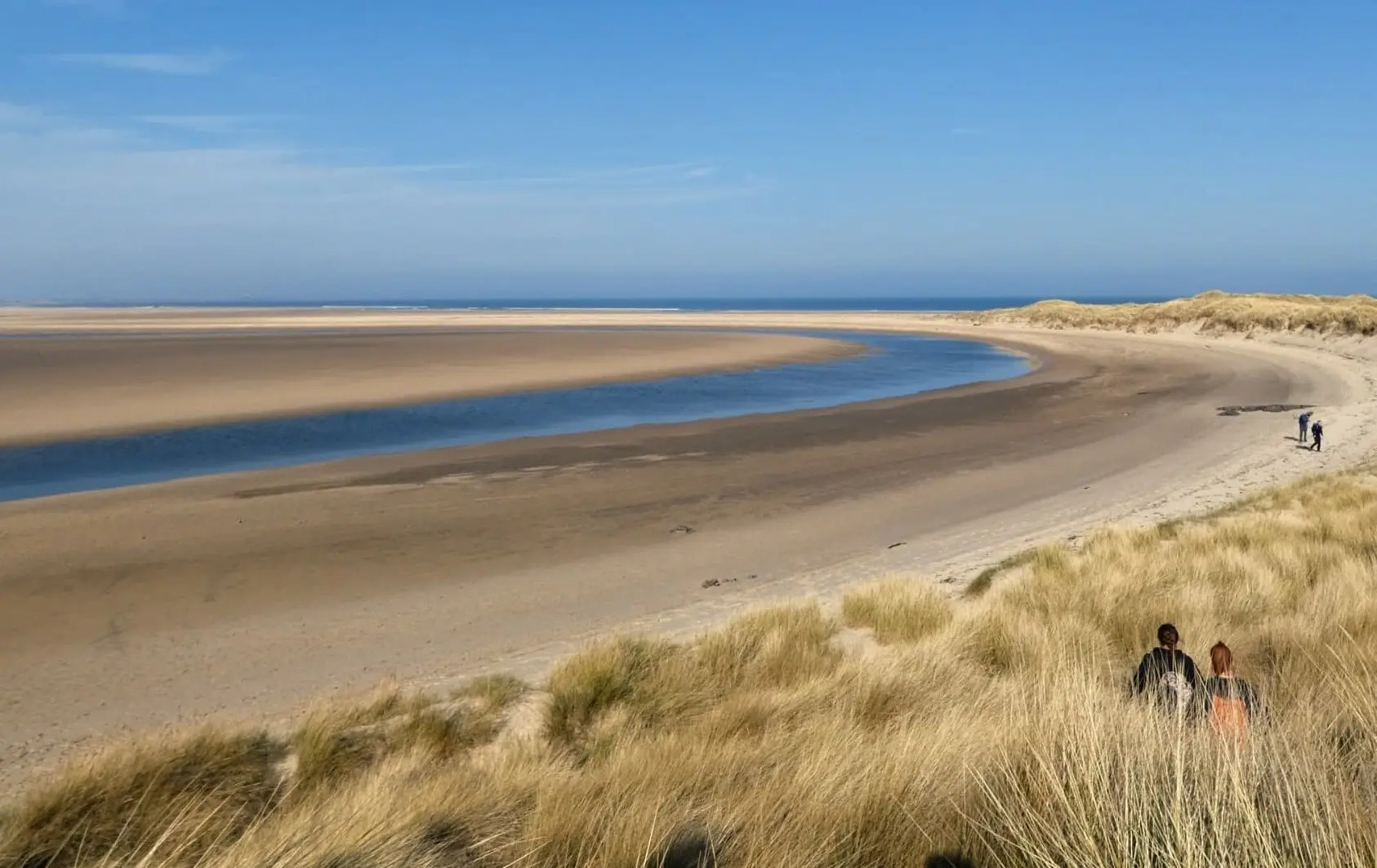 Wide sandy beach and dunes at Budle Bay